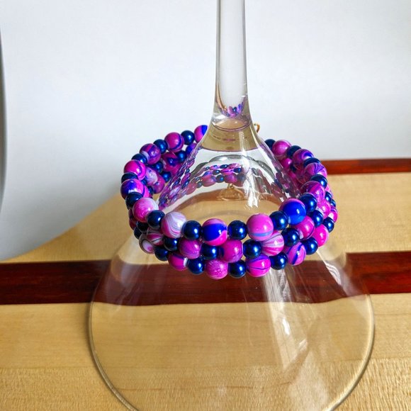 Purple and blue memory wire bracelet with gold finishing charms - Picture 2 of 3